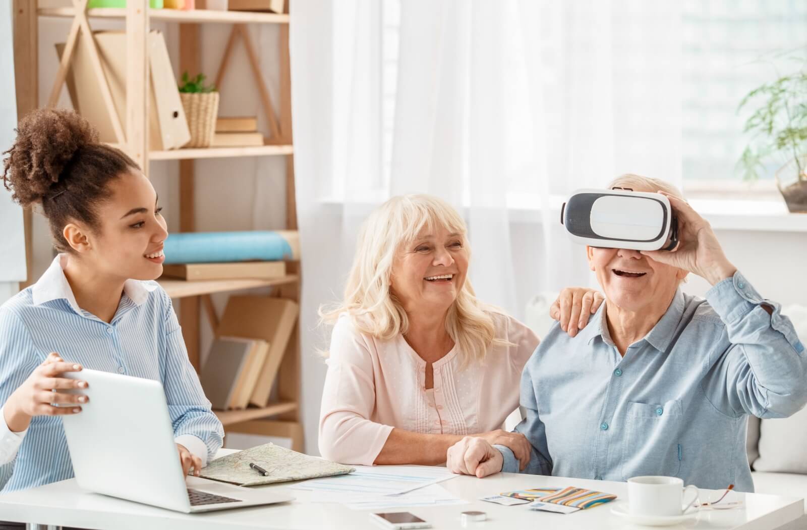 a senior man uses VR headset to do a virtual tour 