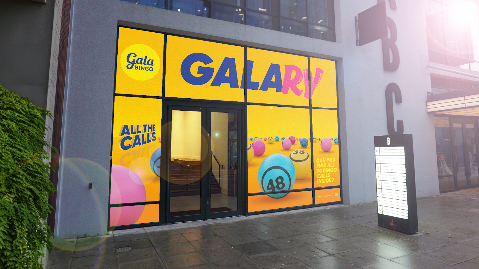 Gala Bingo event in Manchester, yellow store front with bingo balls on it