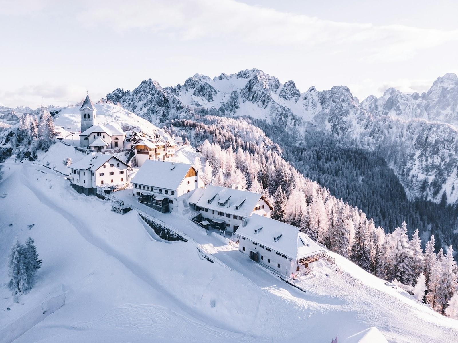 buildings on a snowy mountain