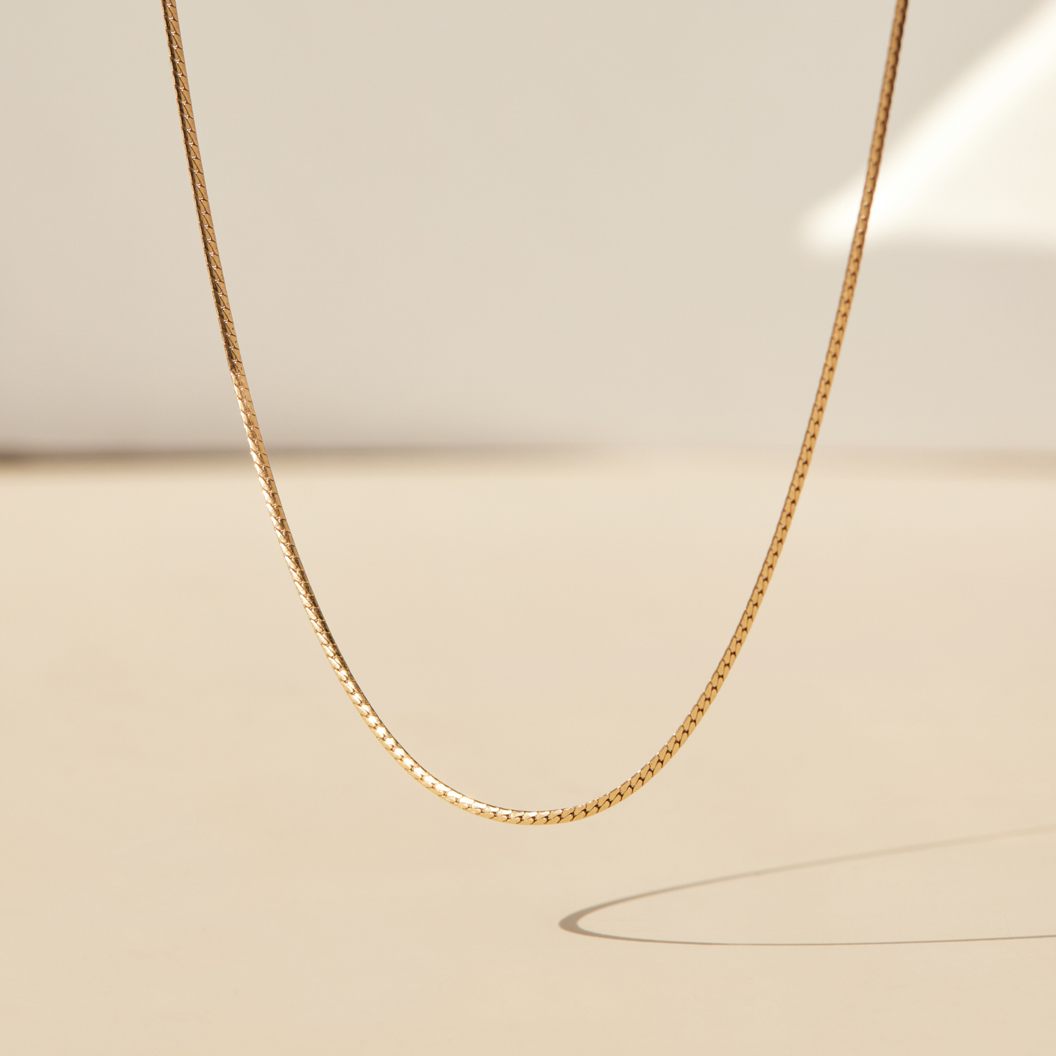 Catbird Swimming Pool Chain - a minimalist necklace crafted in 14k gold.