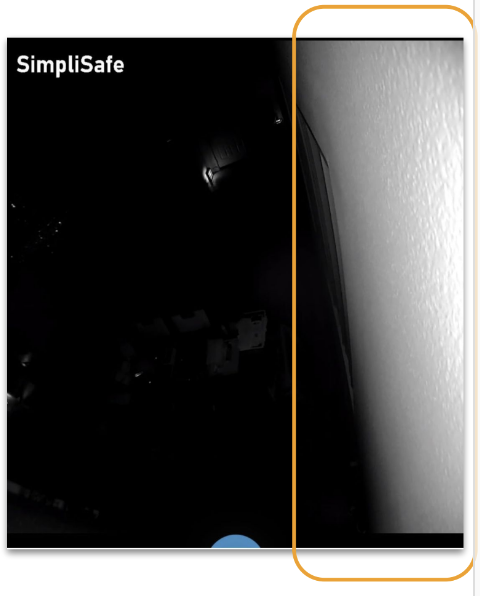 Night vision view of SimpliSafe® camera with darken image, caused by infrared LED bouncing off the wall and interfering with the balance of the image.