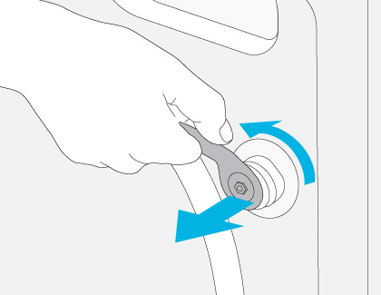 An illustration loosening the shipping bolts by turning counter clockwise and pulling outwards.