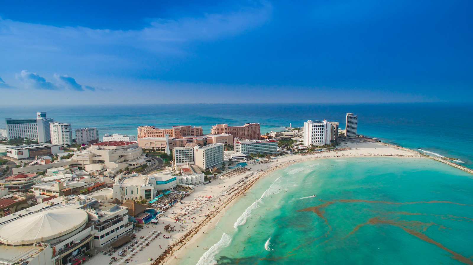 The aerial photo of Cancún, courtesy of dronepicr - Cancun Strand Luftbild, CC BY 2.0