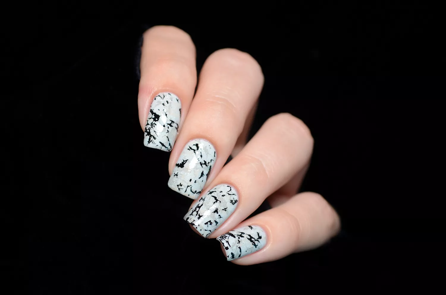 Picture showing a contrasting style of the nail design