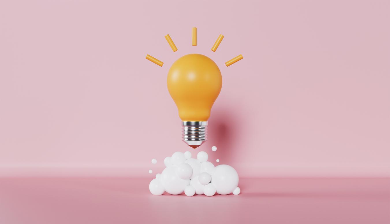 A light bulb with a lightbulb above white bubbles

Description automatically generated with medium confidence