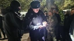 Police in Samara check the documents of migrants in October.