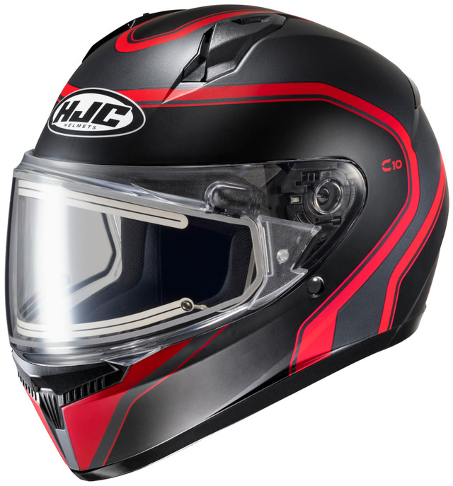 An image of a snowmobiling helmet, complete with a visor, against a blank background