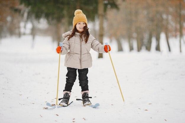 Free photo little girl cross-country skiing