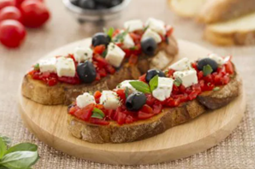 Bruschetta: Grilled bread rubbed with garlic and topped with tomatoes, basil, and olive oil. It's a traditional antipasto from Central Italy.