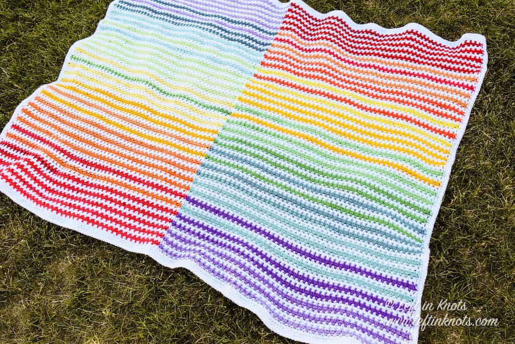Collection of 45 amazing crochet rainbow blanket patterns in various sizes and stitches perfect for both beginners and experienced crocheters. 