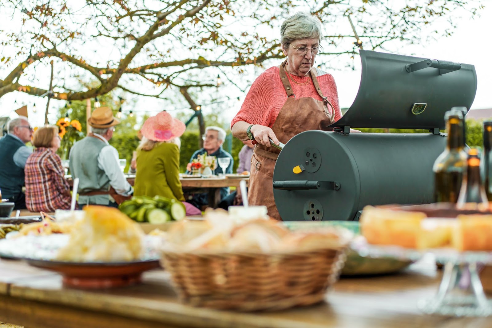 Grandma Grilling Up Food for Friends & Family