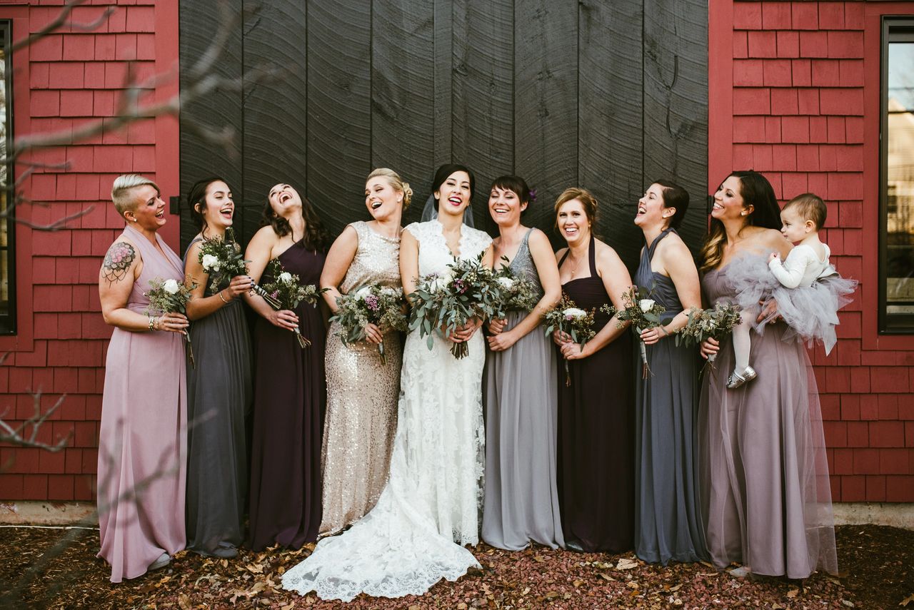 Bride with bridesmaids in dresses.

