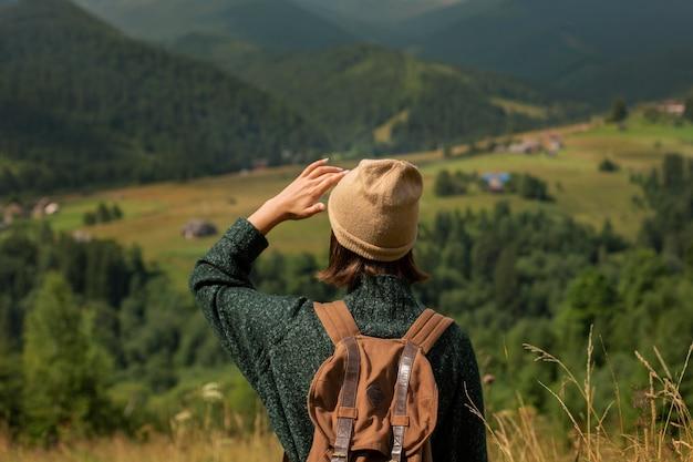 Woman exploring beautiful rural surroundings