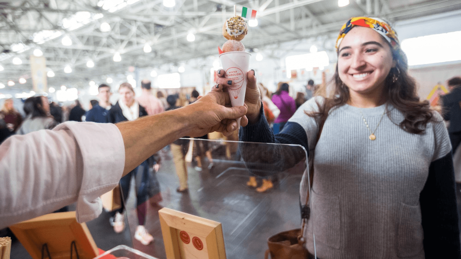 Woman buying ice cream at event