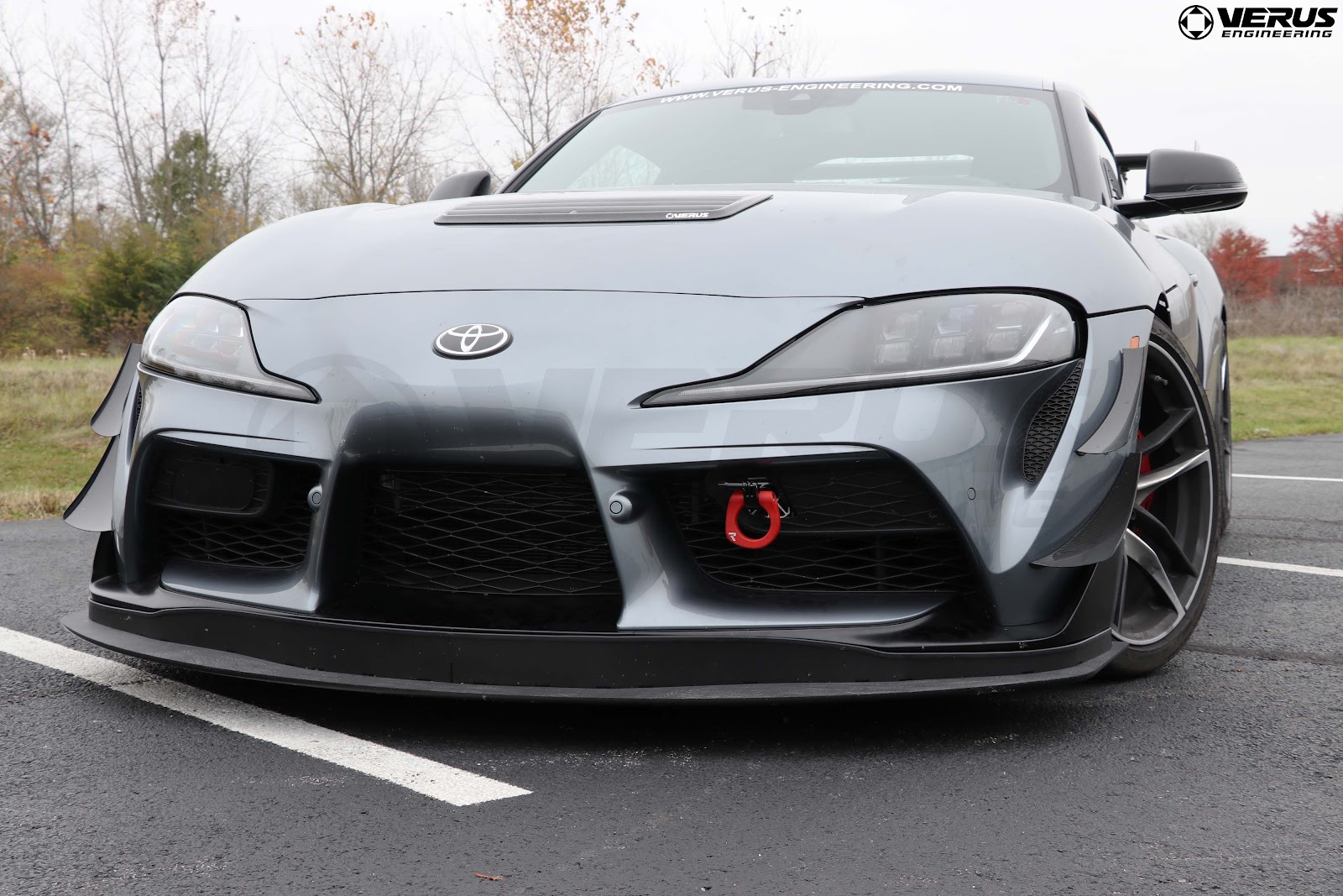 Toyota Supra MK5 with aftermarket front splitter and dive planes