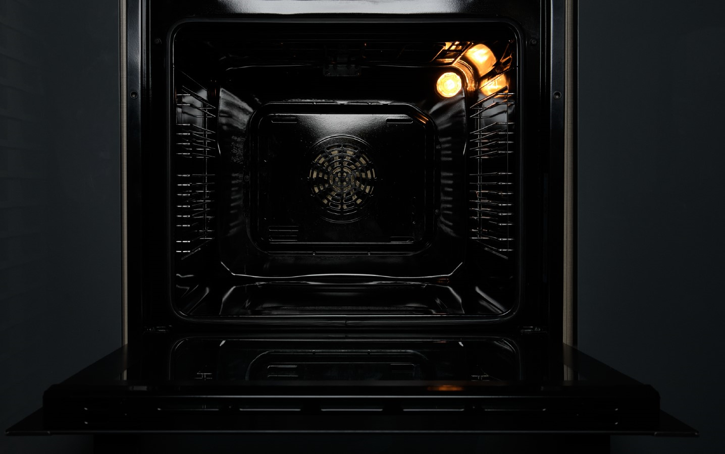 An oven with lights in it

Description automatically generated
