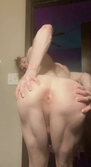 Jesse Stone stretching his ass cheeks to reveal his shaved gay asshole ready for gay bareback sex