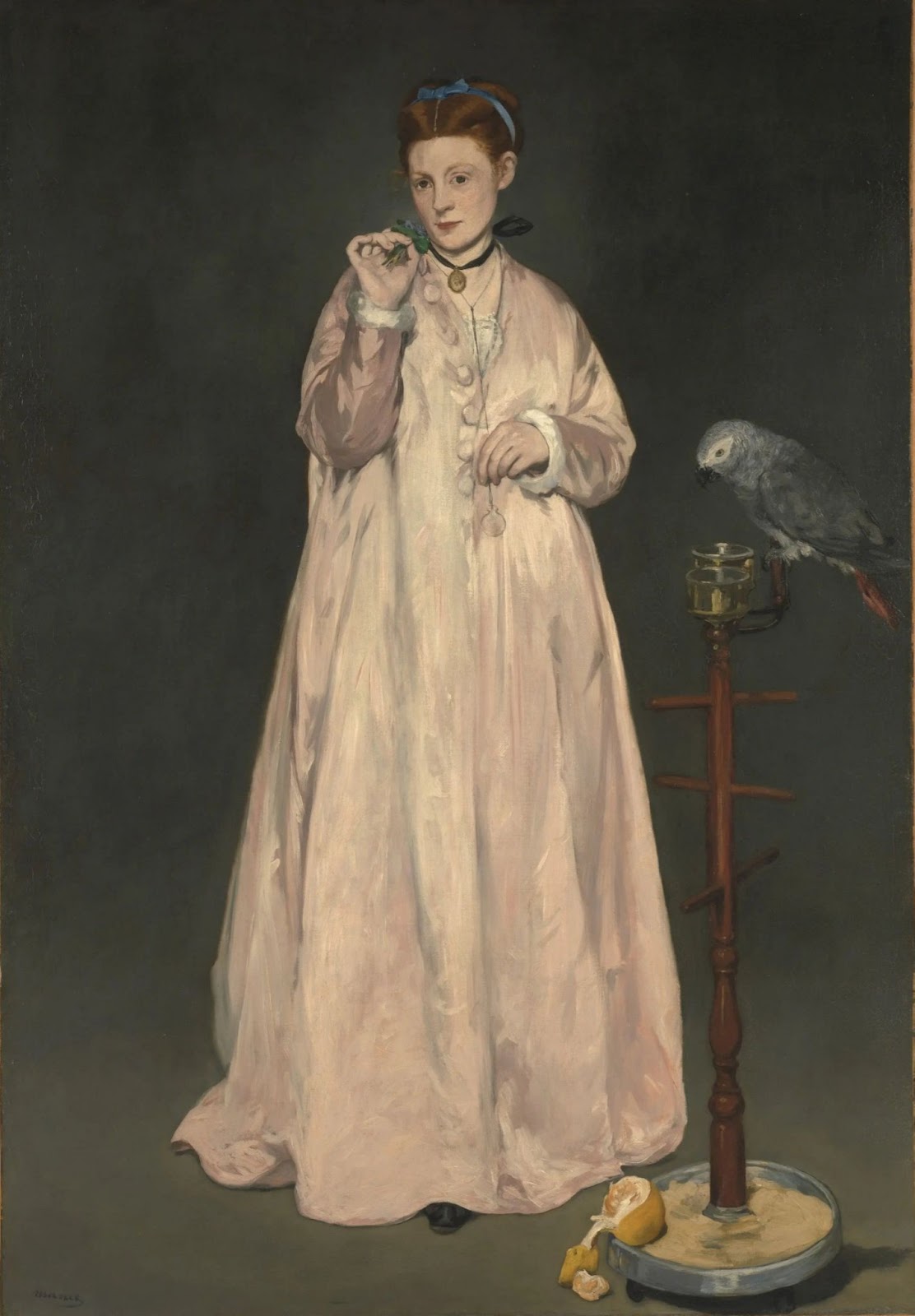 Молодая женщина с попугаем