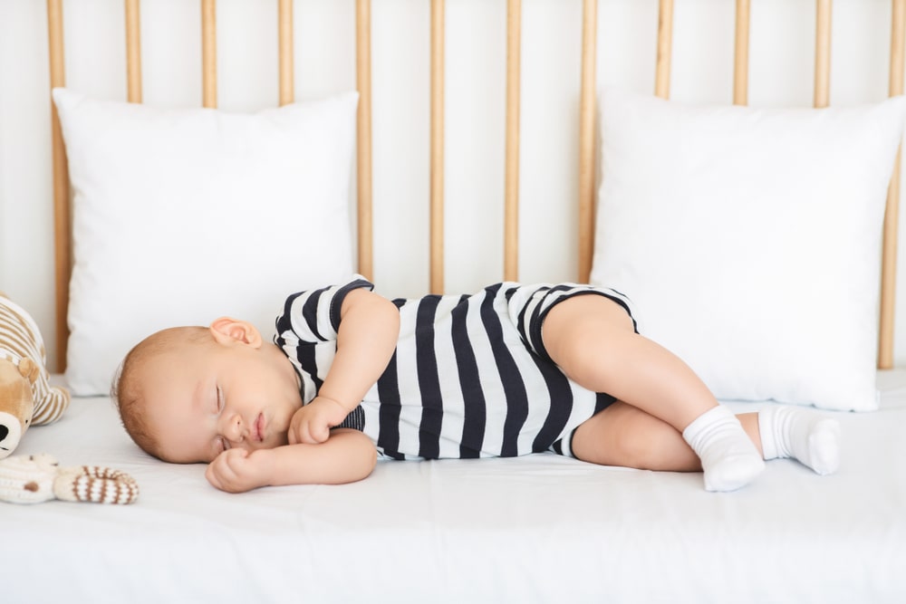 Tips For Preventing Your Baby From Sleeping On Their Side
