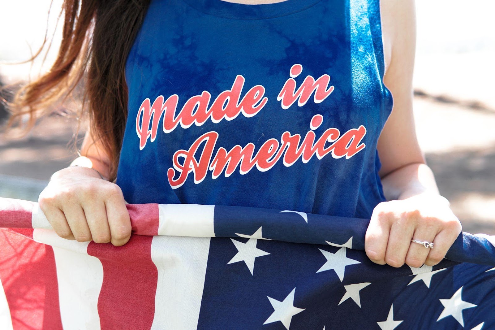 a woman wearing a shirt that says Made in America