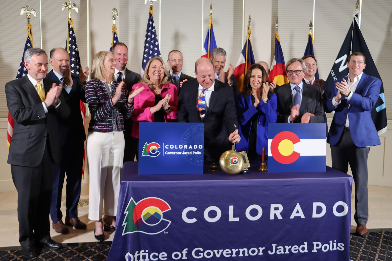 Governor Polis rings the bell to close trading on the New York Stock Exchange alongside Colorado business leaders.