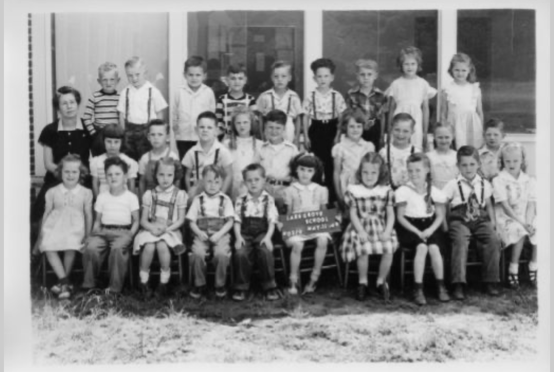 A group of children posing for a photo

Description automatically generated