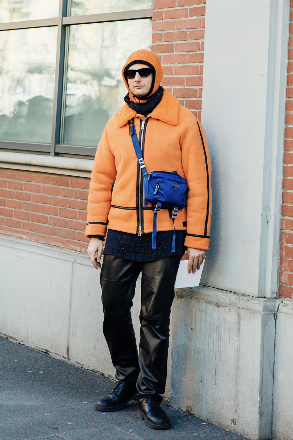 Picture showing a guy in an orange bomber jacket for the event