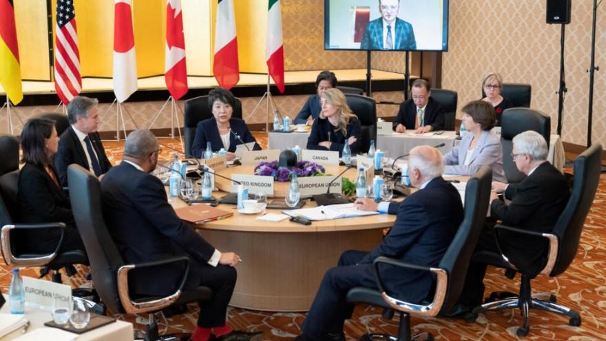 Ukraine's Foreign Minister Dmytro Kuleba is seen on a monitor as Germany's Foreign Minister Annalena Baerbock, U.S. Secretary of State Antony Blinken, Japan's Foreign Minister Yoko Kamikawa, Canada's