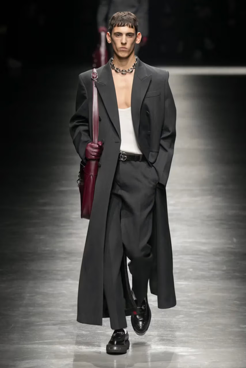 Picture showing a model for Gucci at the runway for Milan Fashion Week Men’s FW24