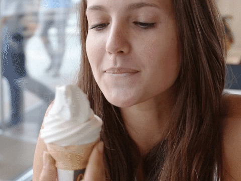 A Girl is Licking Ice cream in Style