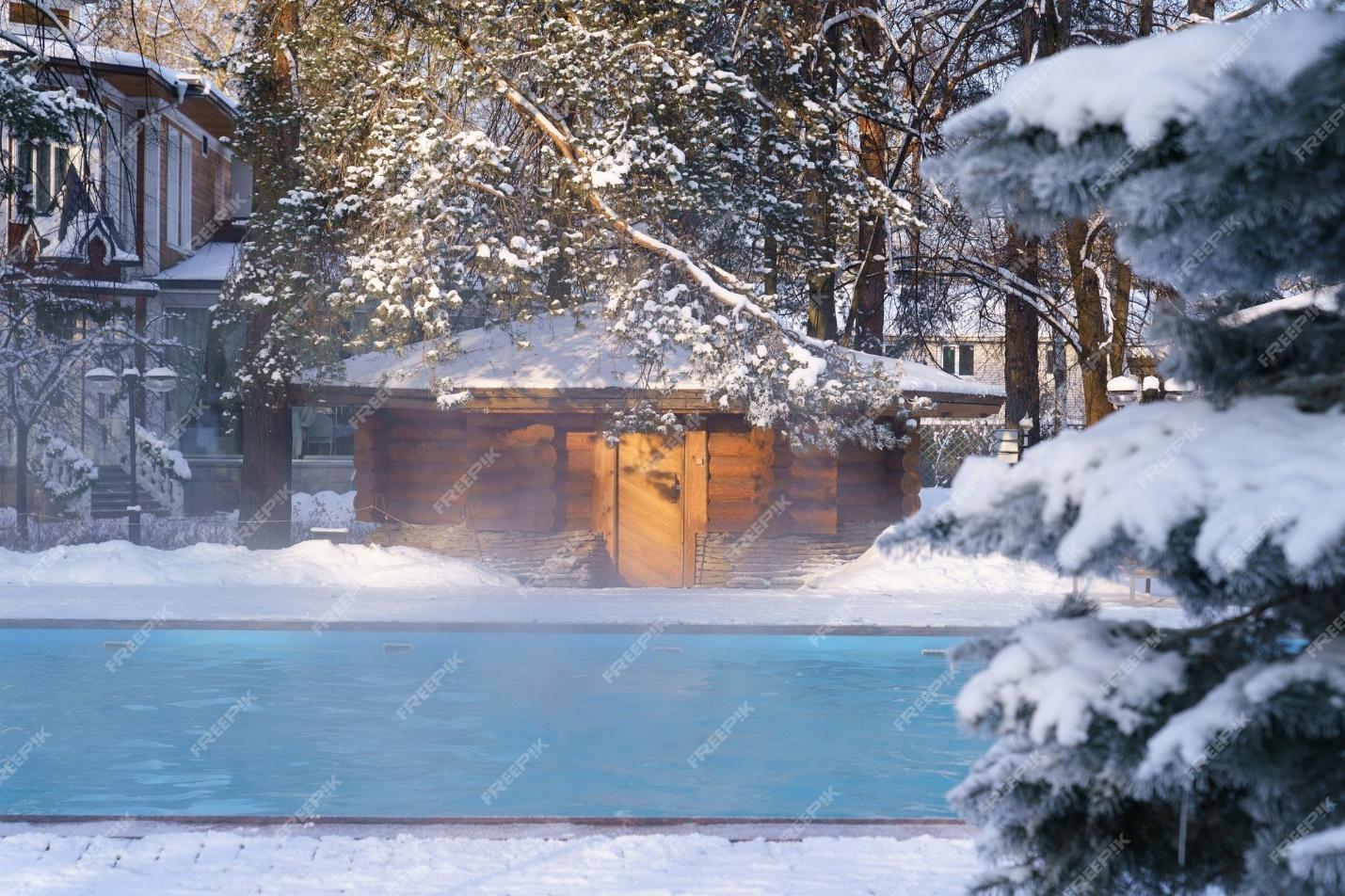 Premium Photo | Winter wellness spa resort center with outdoor swimming  pool of thermal water stream in frozen air
