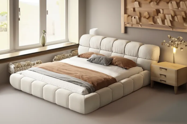 A white queen bed frame with fabric upholstery, featuring high-density sponge and a low headboard.