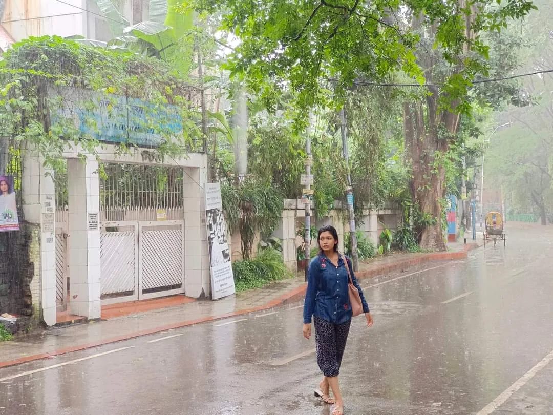 The allure of rain in Dhaka is undeniable. As droplets cascade from the sky, they transform the cityscape into a mesmerizing tableau of sights and sounds. | Photo: Farzana Chaity