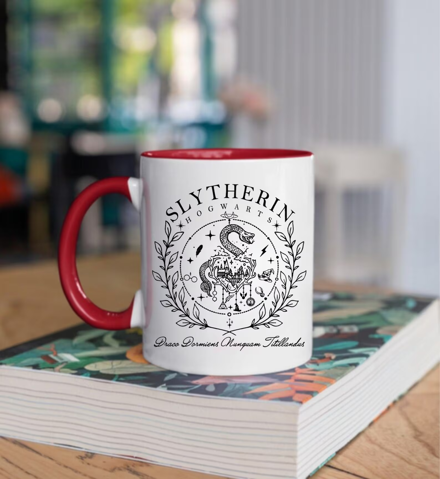 A mug with the Slytherin house crest