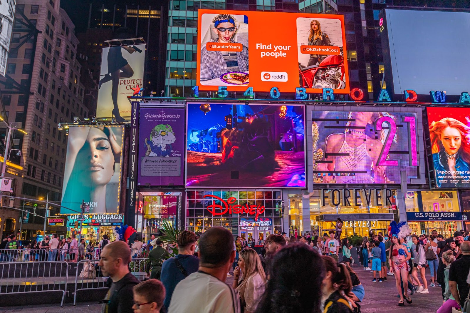 Reddit advertisement featuring r/BlunderYears and r/OldSchoolCool in New York Times Square