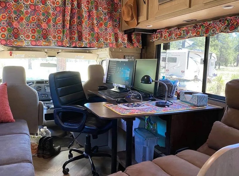 Motorhome with an office space set up inside for working from the road