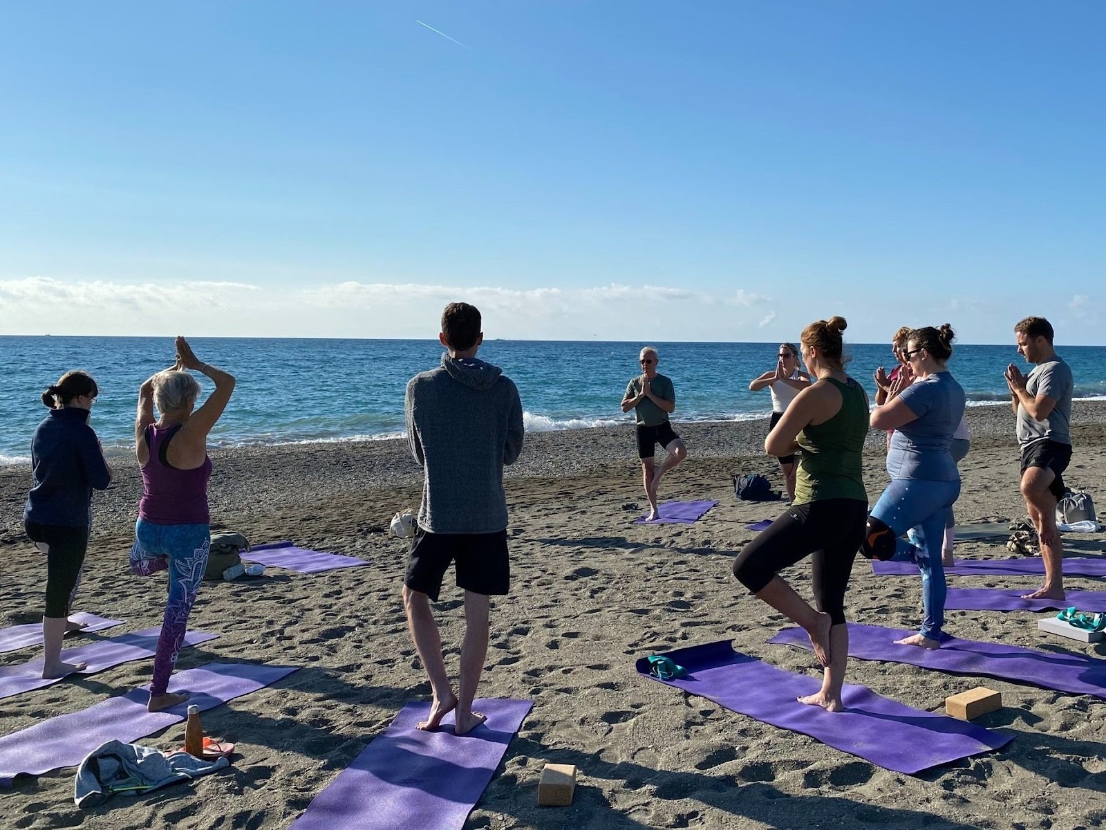 Yoga-Tree-pose-on-beach-group-with-Jane-Bakx-Yoga-In-Spain