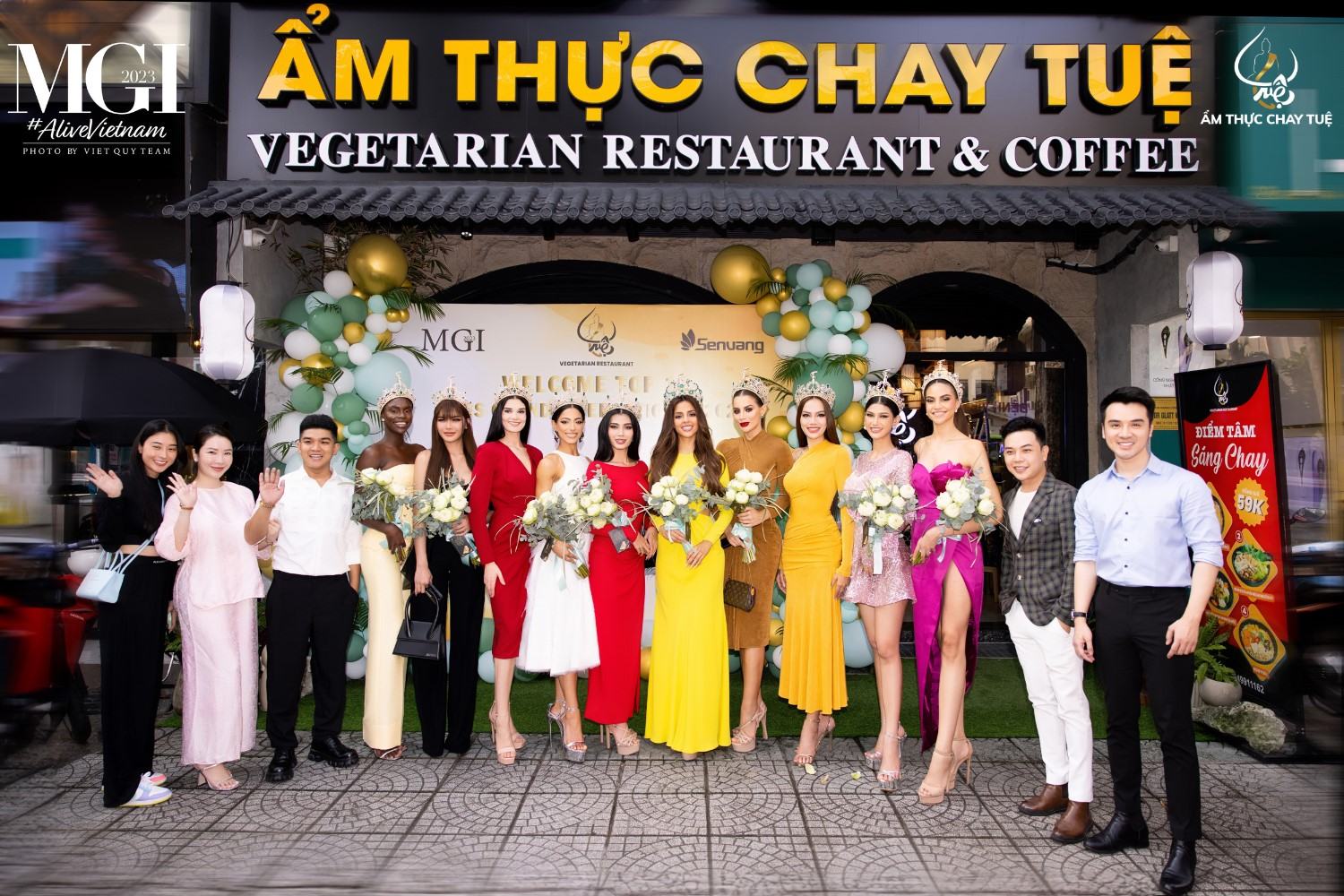 A group of people posing for a photo Description automatically generated