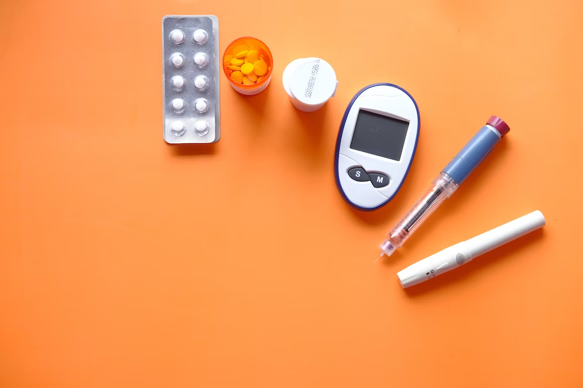 a collection of medications and testing equipment for diabetes