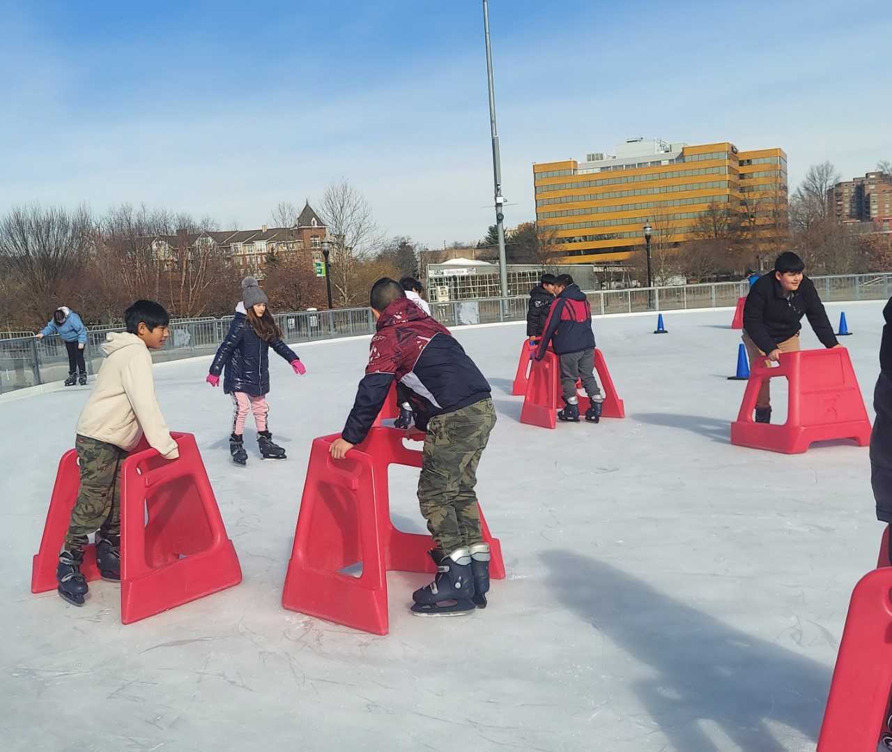 Students ice skating at Mill River Park
