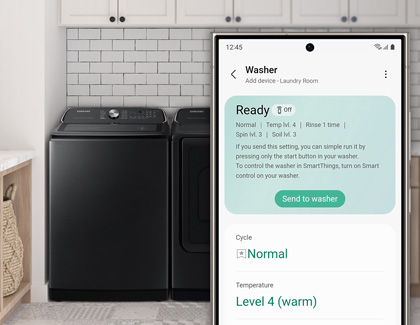 A Galaxy phone in front of a Samsung washer using the SmartThings app to control a Samsung washer