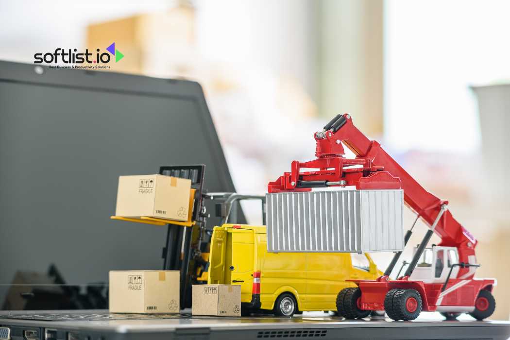 Miniature forklift and crane with boxes on a laptop