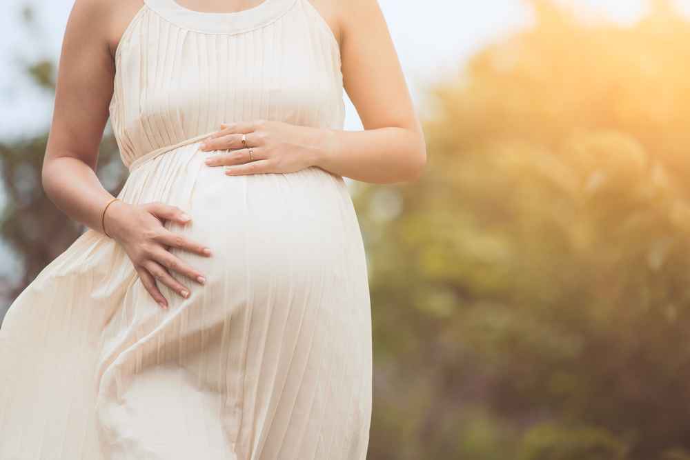 A woman with baby bump