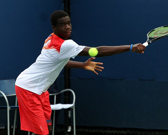 spotcovery-Francis Tiafoe playing at the junior level for the USA-black-tennis-players-who-have-featured-in-the-australian-open