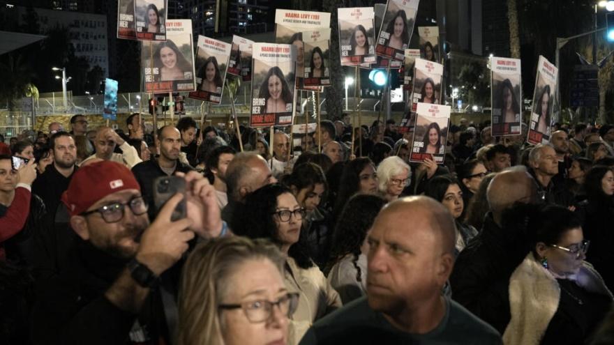 People hold signs showing a picture of a hostage during a demonstration calling for the release of the hostages taken by Hamas militants to Gaza during the Oct. 7th attack, during a demonstration in T