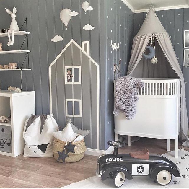 A whimsical cloudy themes baby boy's nursery.