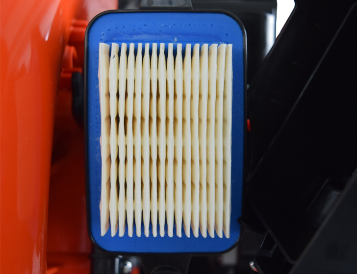 The backpack blower's air filter. It helps prevent dirt and debris from entering the motor.