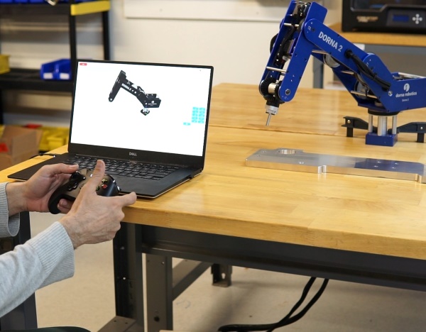 Automation robotic arm and moving it using a robot arm controller.