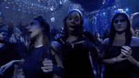 Gif of Sassy Girls Celebrating at a New Years Party