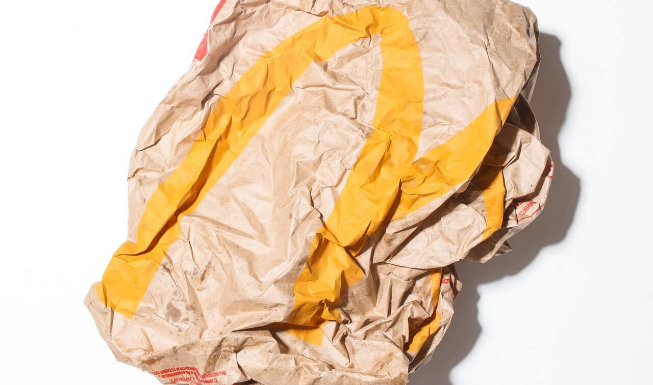 crumpled fast food bag from the least healthiest fast food restaurant
